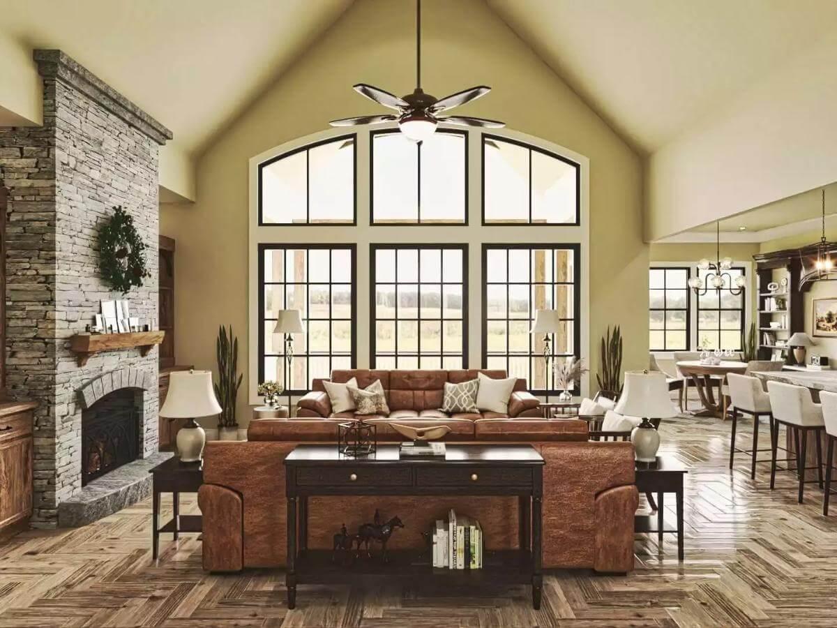 Notice the Stunning Vaulted Ceiling and Expansive Windows in This Open Living Area