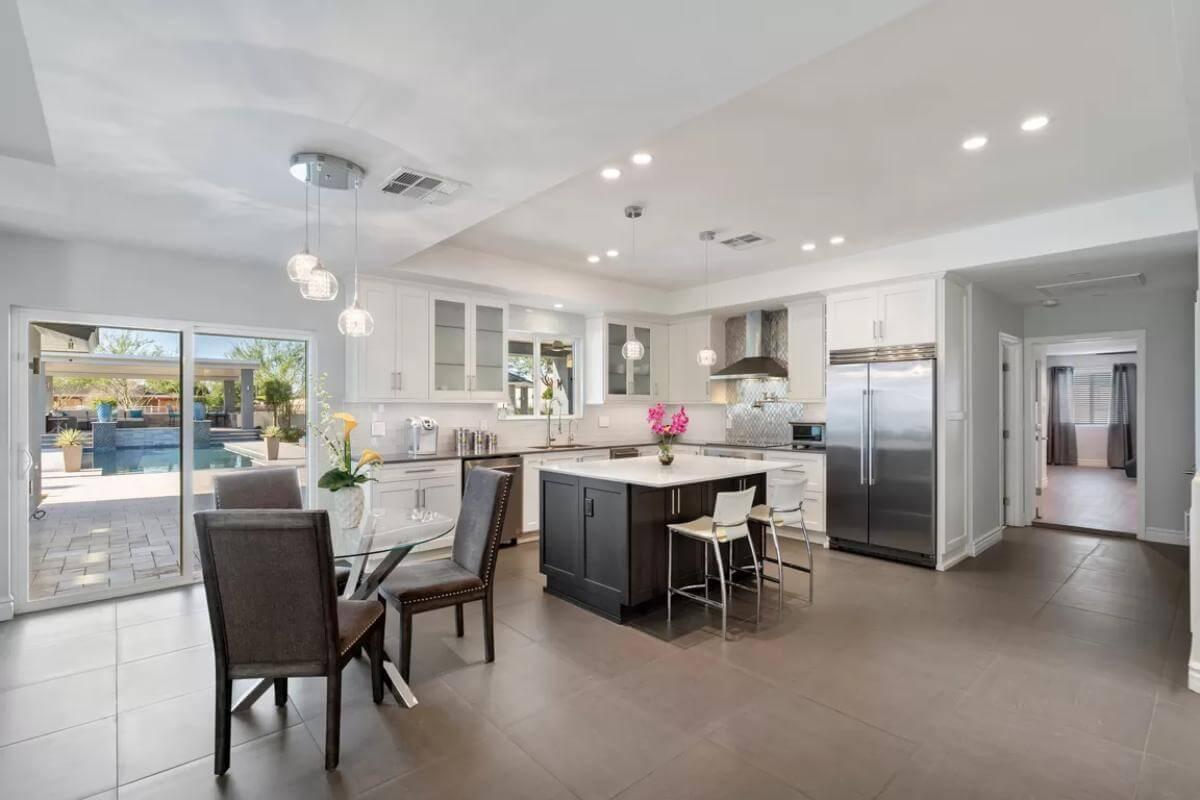 Notice the Seamless Flow from Kitchen to Poolside Patio