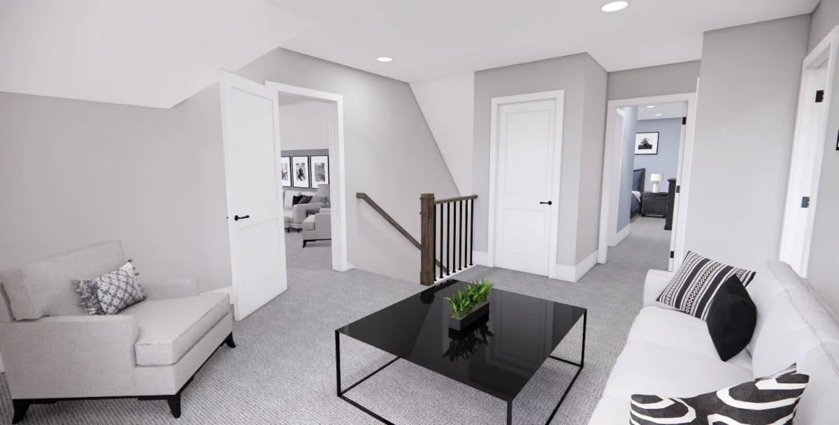 Cozy Loft Area with Sleek Black Coffee Table and Plush Seating