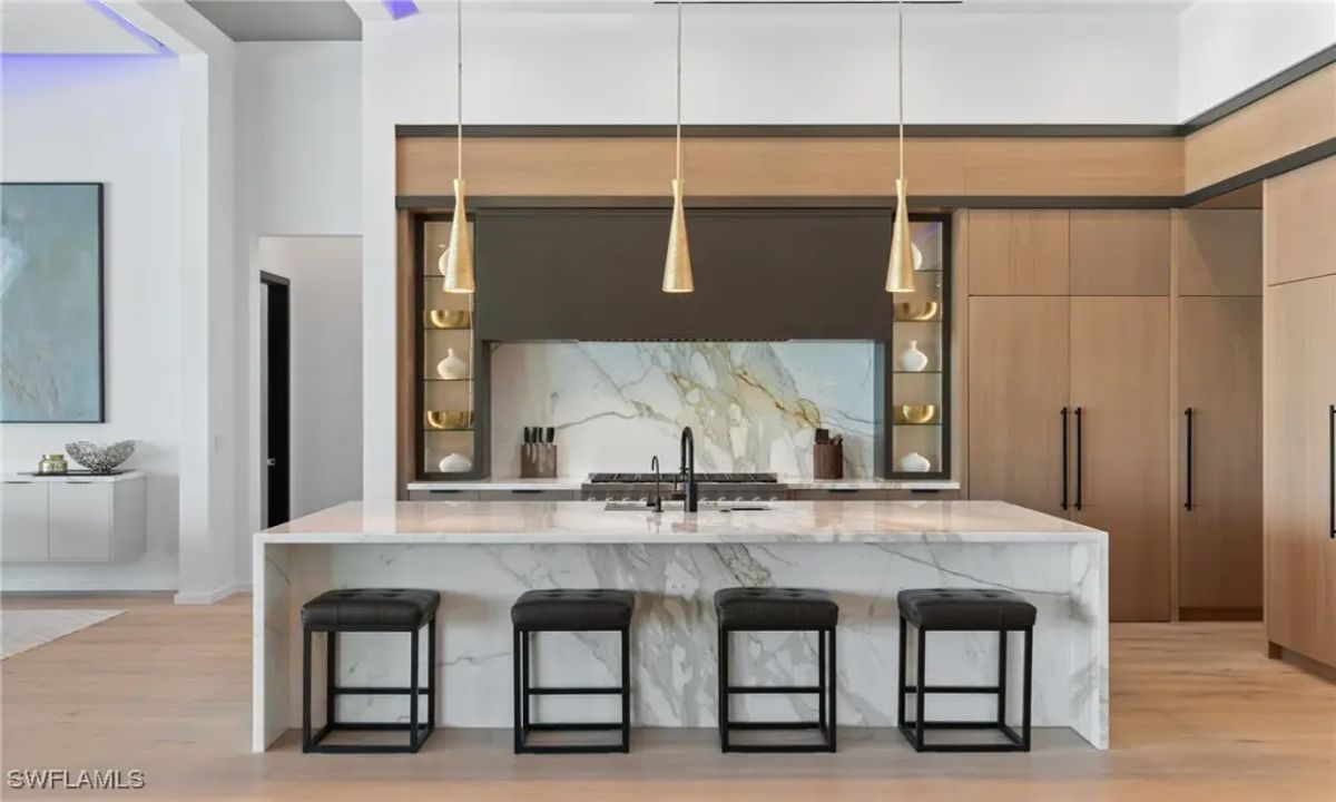 Elise Starr, Olesya Marta, Pa @ John R. Wood Properties, Douglas Elliman Florida,LLC via Coldwell Banker Realty