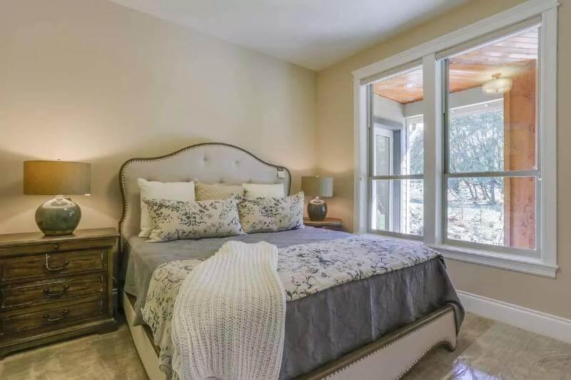 Explore the Serene Elegance of a Craftsman Bedroom with Garden Views