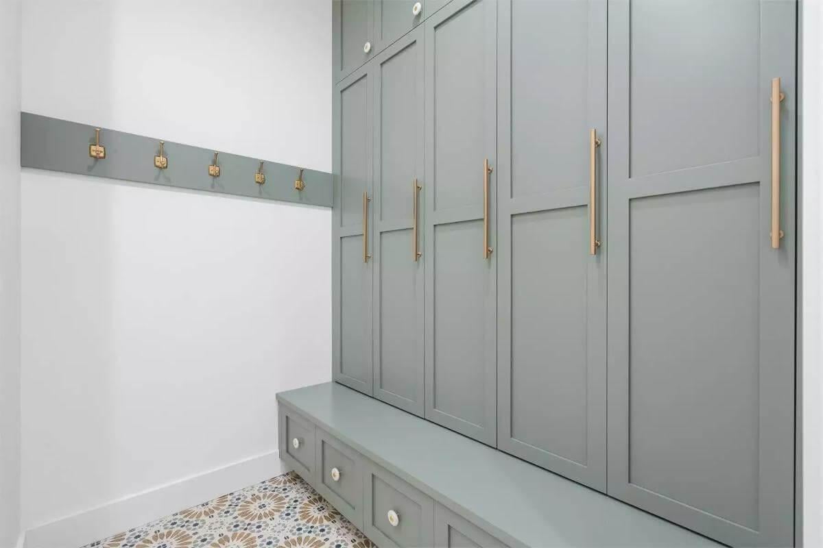 Chic Entryway Featuring Those Sleek Green Cabinets