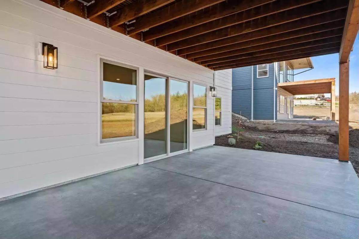Explore the Spacious Covered Patio for Relaxation or Gatherings
