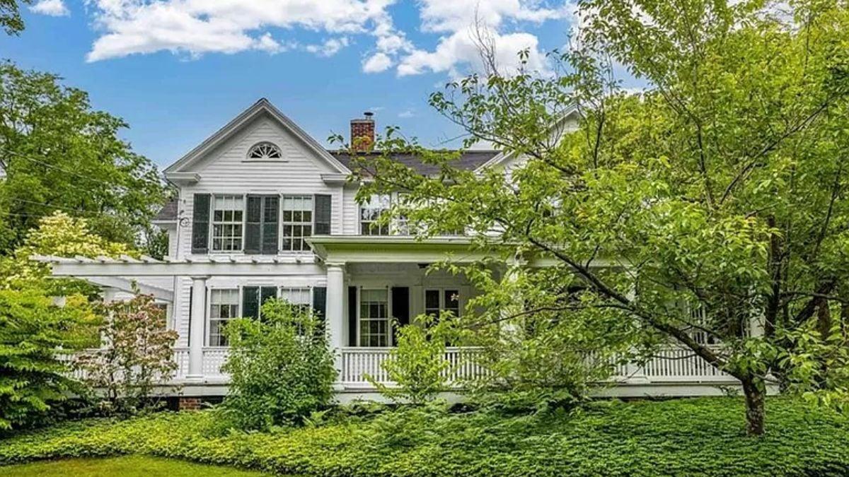Charming White Colonial with a Welcoming Veranda
