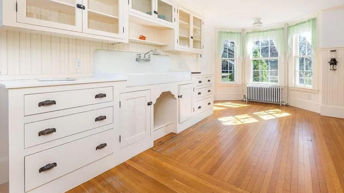 Vintage Kitchen Charm with Butcher Block Counters and Bay Windows