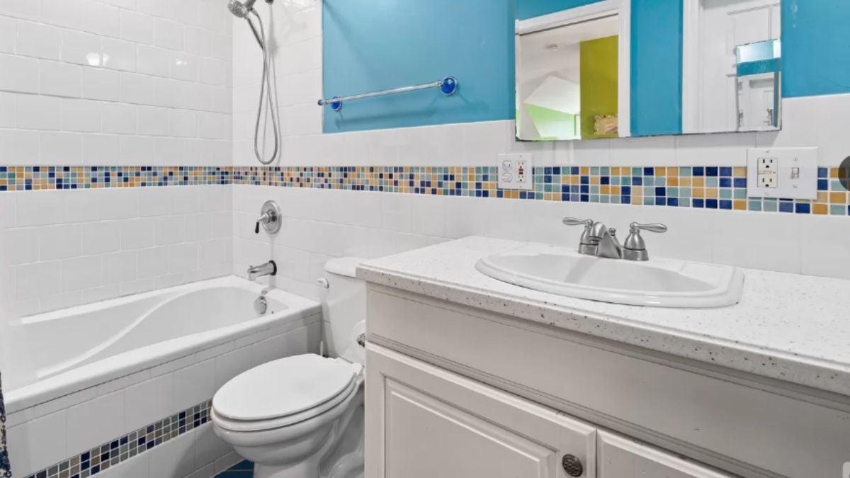 Vibrant Bathroom with Fun Mosaic Tile Accents