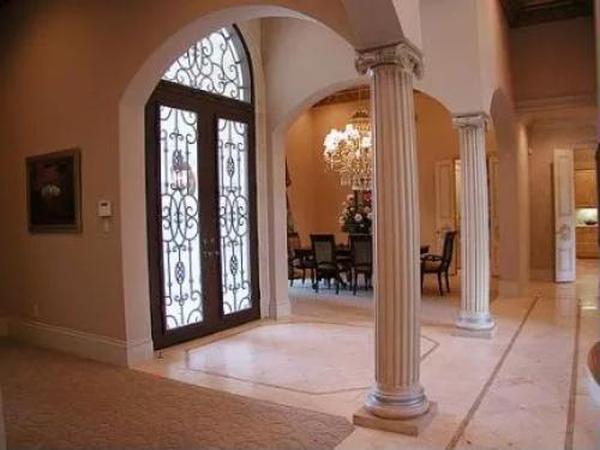 Notice the Ornate Ironwork on This Grand Entrance Within
