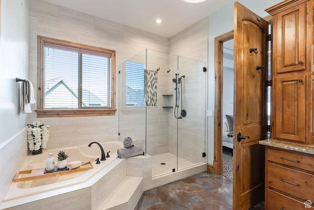Classic Craftsman Bathroom with Wood Accents and Glass Shower