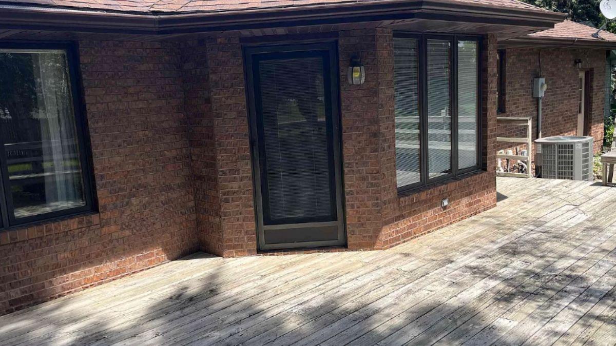 Step Onto This Expansive Brick Patio