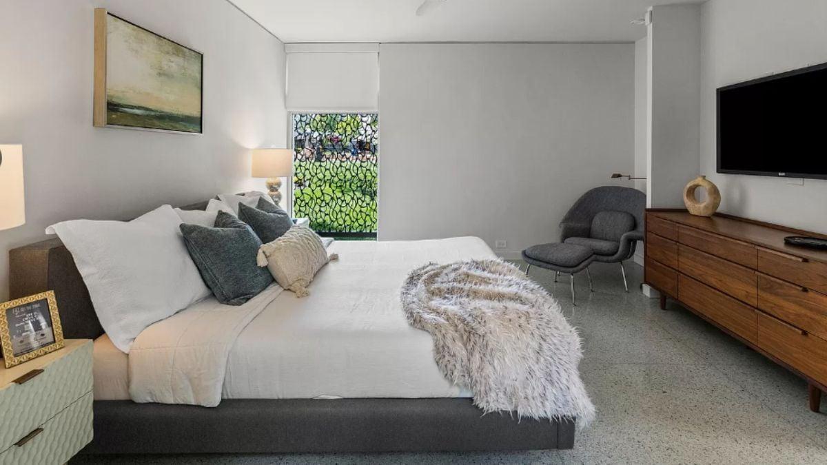 Notice the Textured Rug Adding Warmth to This Modern Bedroom