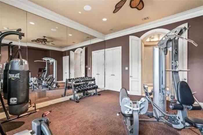 Home Gym with Wall-to-Wall Mirrors Enhancing the Space