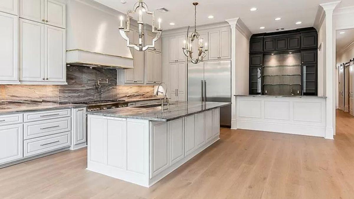 Check Out the Chic Chandelier Lights Enhancing This Gourmet Kitchen