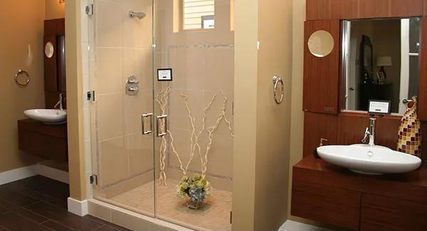 Double Vanities and a Glass-Enclosed Shower Make This Bathroom Sing