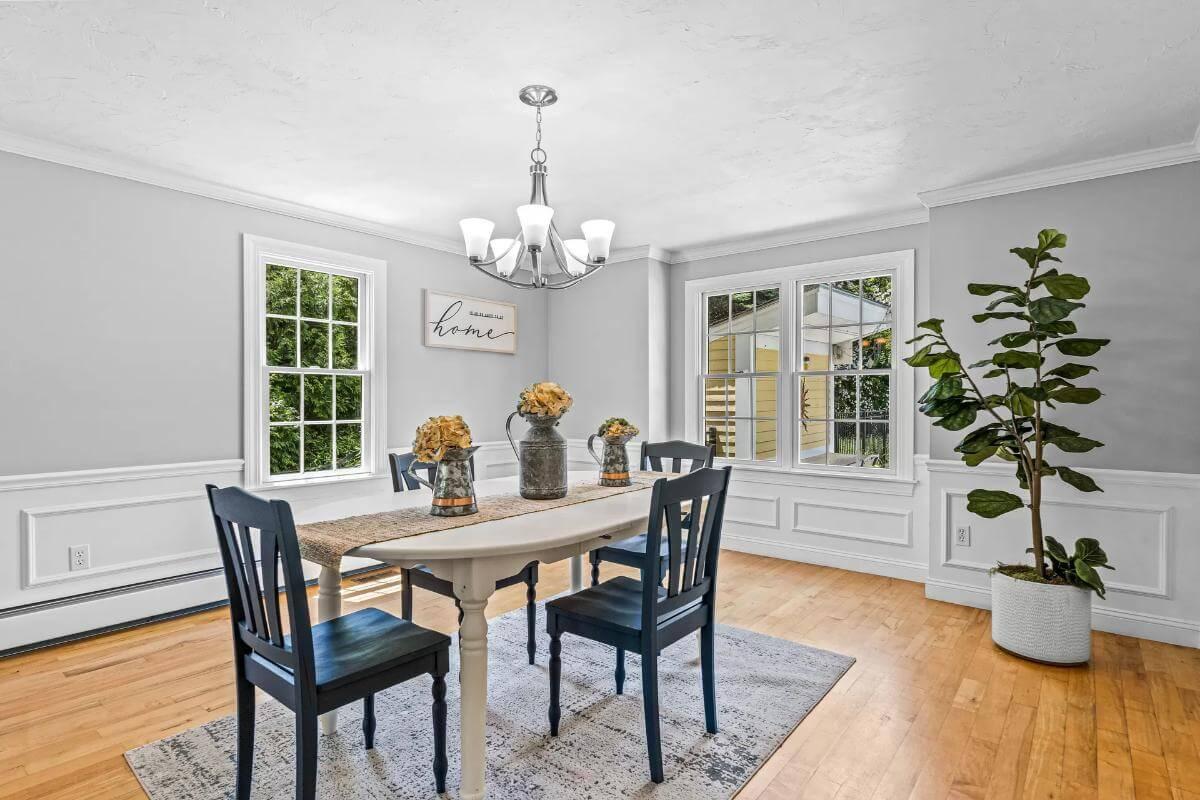 Spot the Classic Wainscoting in This Sunlit Dining Room