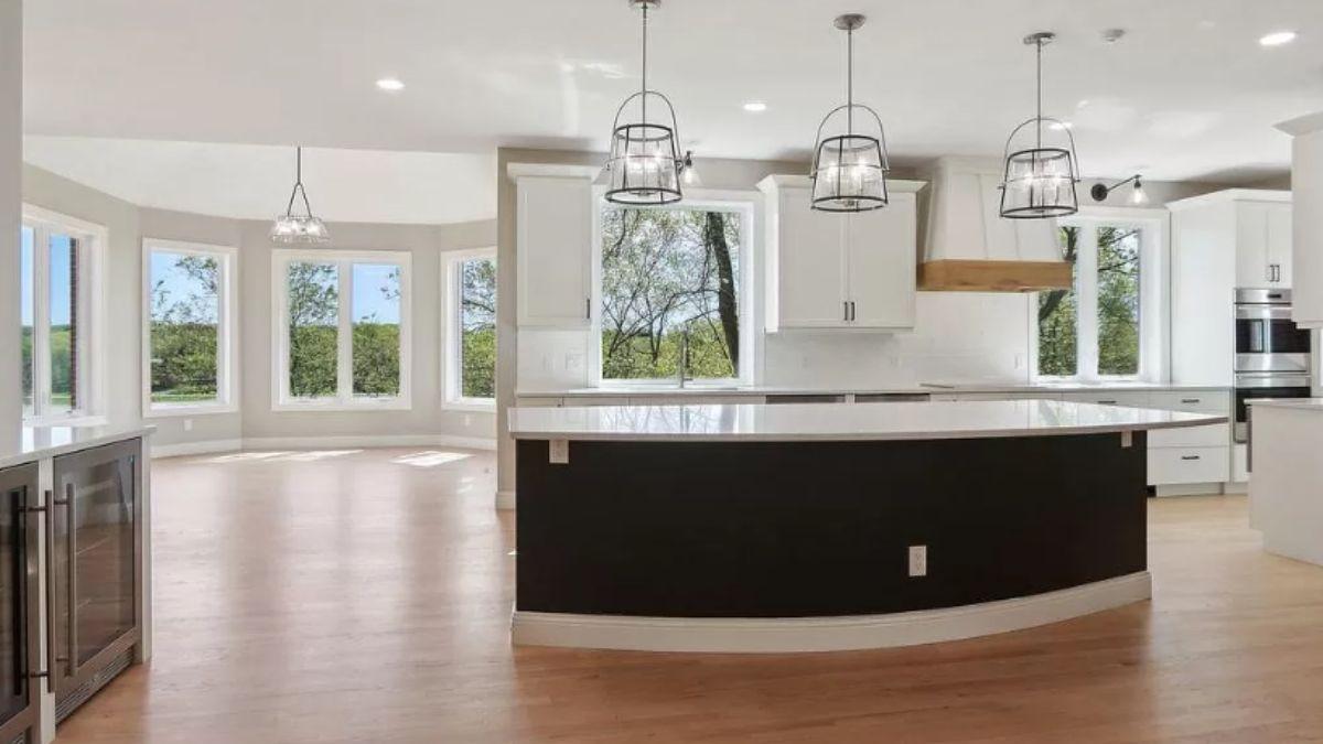 Check Out the Expansive Island in This Bright Kitchen