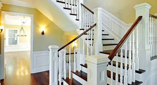 Elegant Staircase with Craftsman Details and Rich Wood Tones