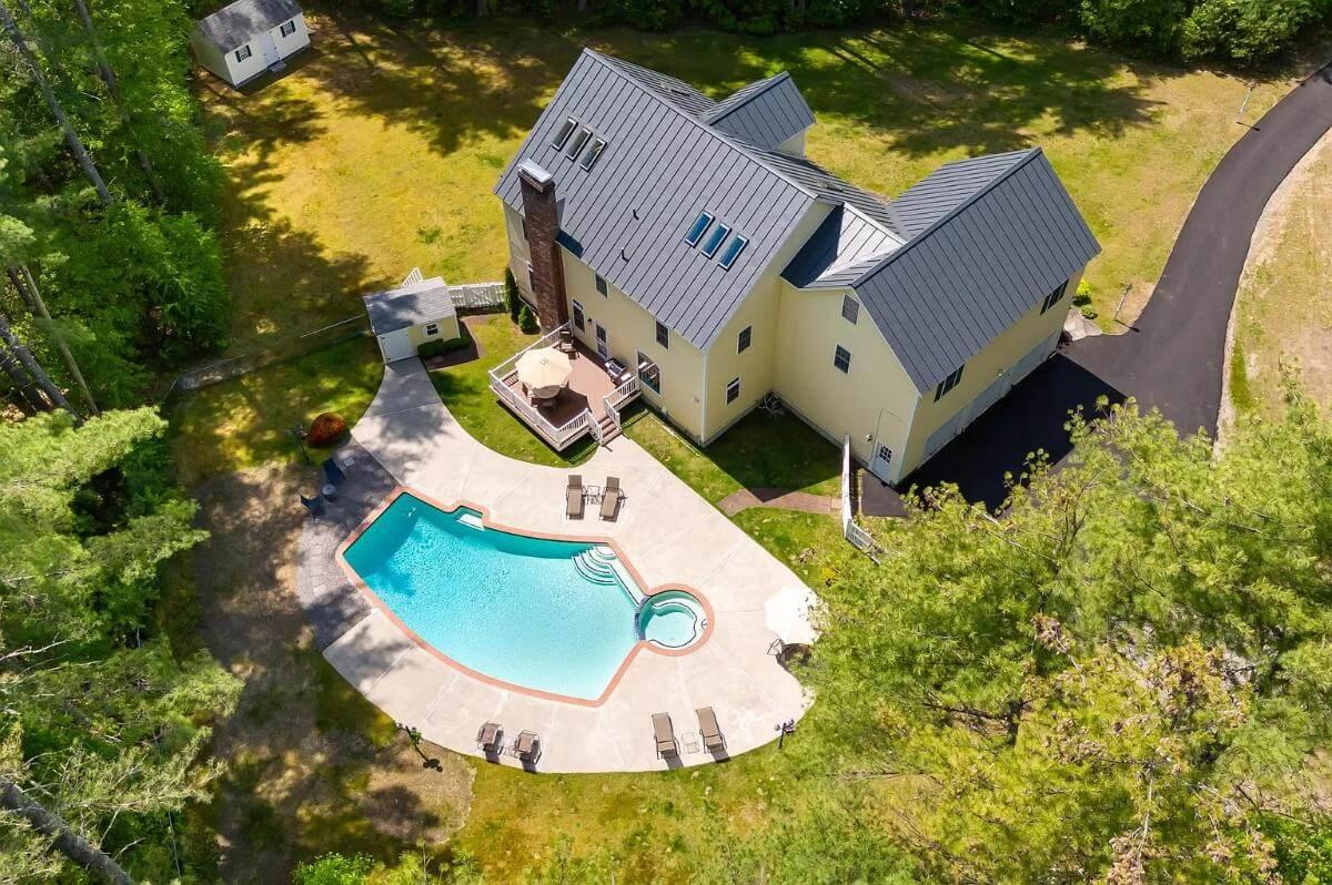 Admire the Poolside Charm of This Colonial Gem