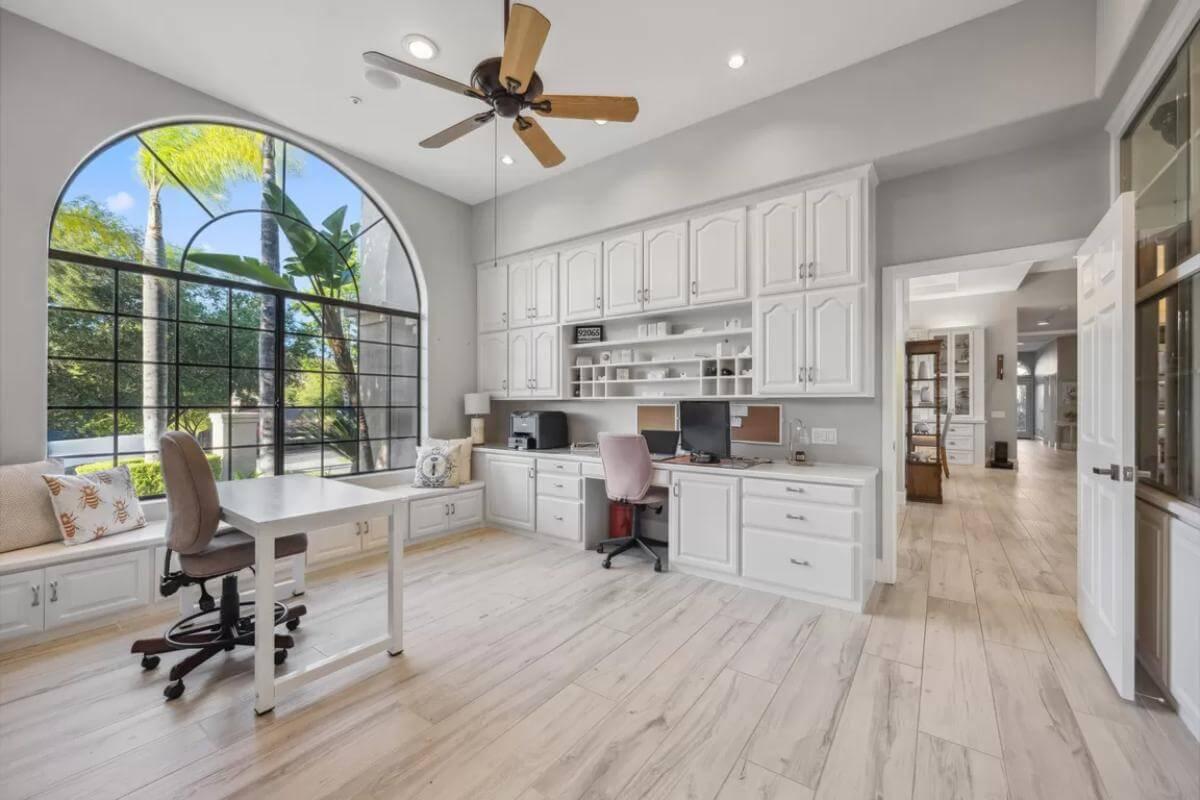 Explore This Sun-Drenched Home Office with an Arched Window