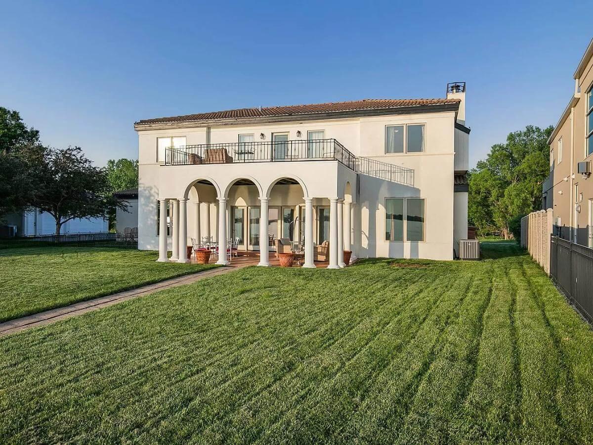 Arched Elegance with a Mediterranean Balcony
