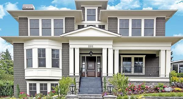 Craftsman Facade with Classic Columns and Bay Windows