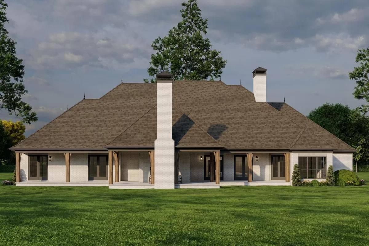 Enjoy the Expansive Backyard View with Dual Chimneys and Timber Accents