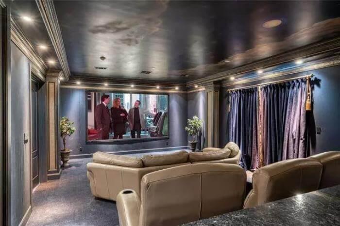 Experience Cinematic Luxury in This Plush Home Theater