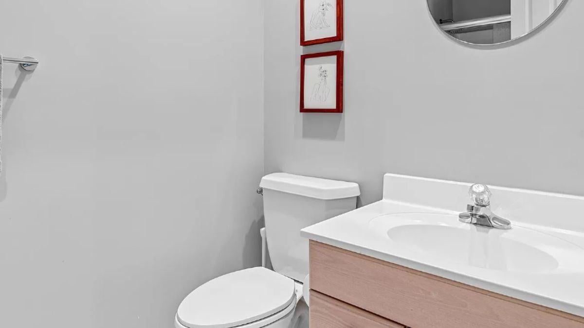 Minimalist Powder Room with Clean Lines and Subtle Art