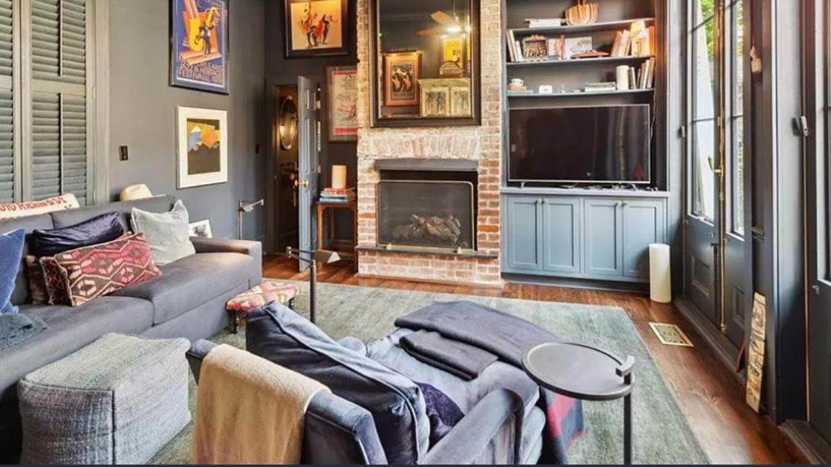 Moody Living Space with Ornate Brick Fireplace