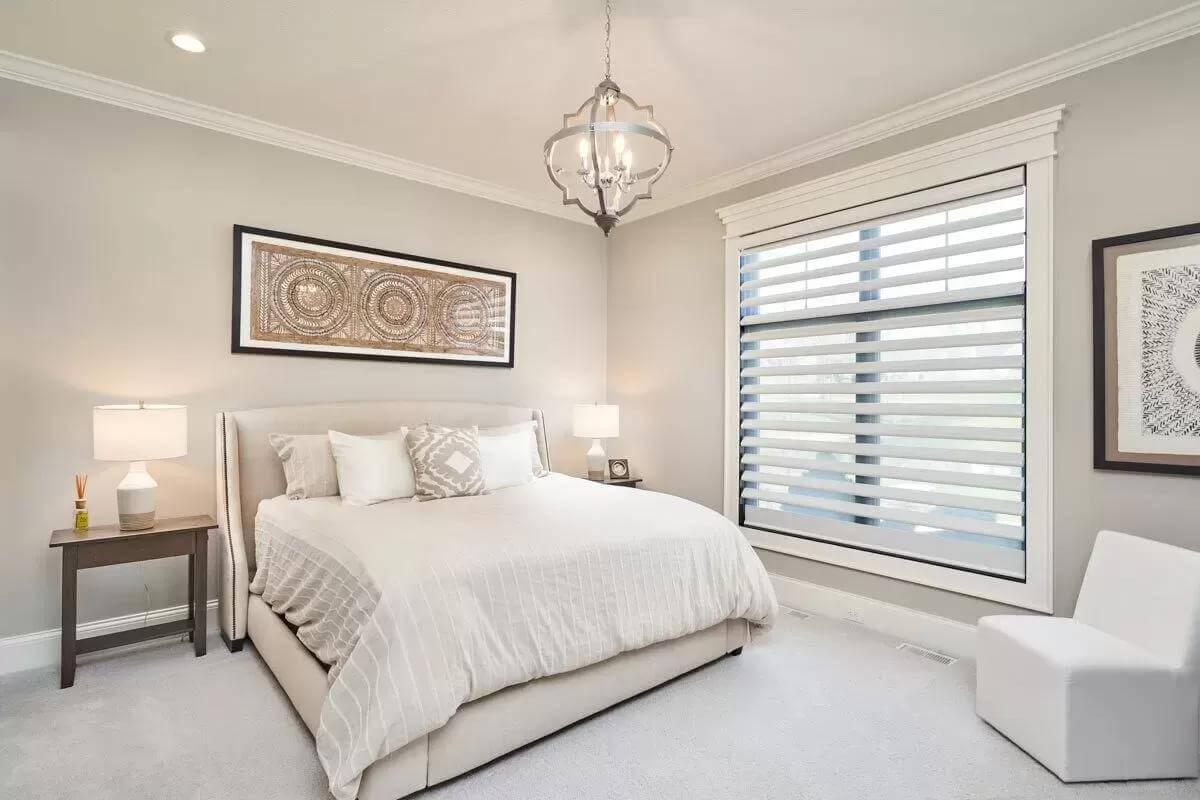 Spacious Bedroom with Modern Accents and Statement Lighting