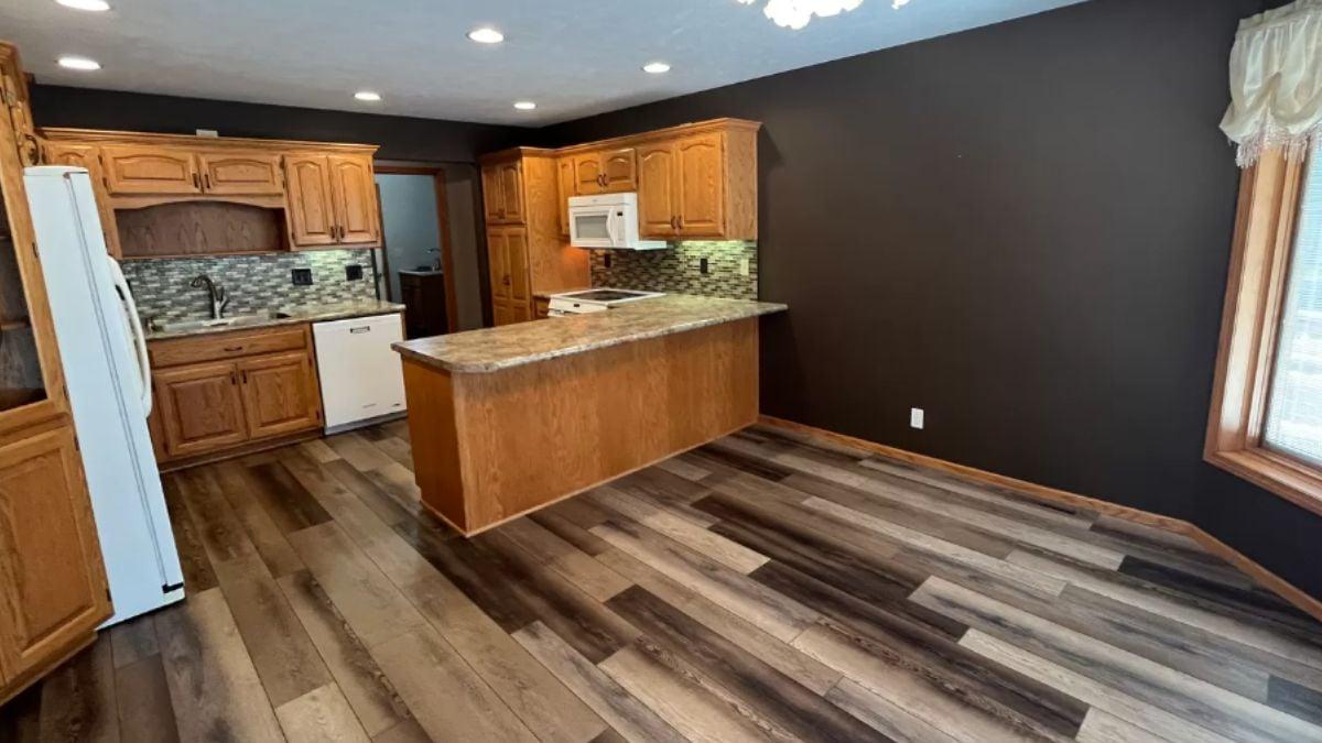 Classic Kitchen Design with Rich Wood Cabinetry