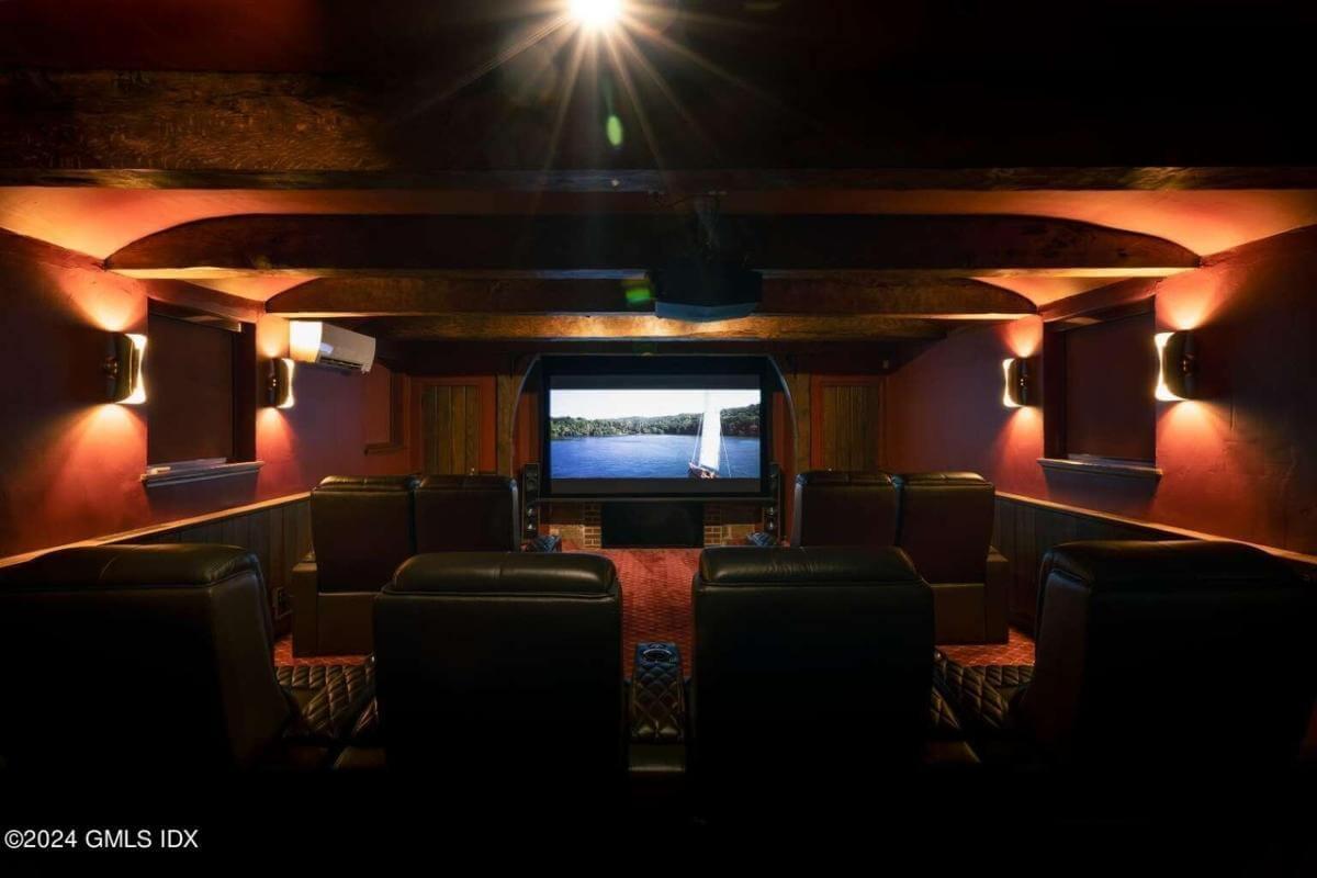 Sink Into Luxury Seating in This Home Theater Escape
