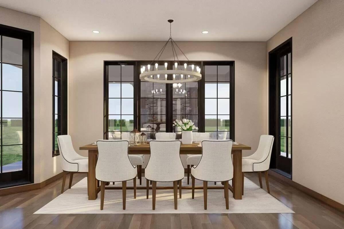 Experience the Warmth of This Dining Room with Picture Windows