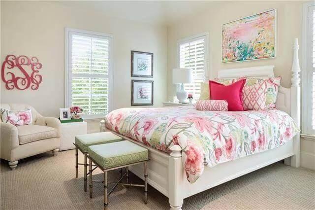 Vibrant Bedroom with Floral Accents and Cozy Seating Nook