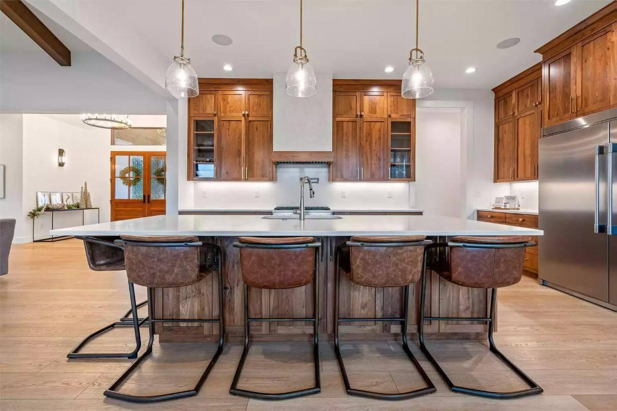 Craftsman Kitchen with Rich Wood Cabinetry and Chic Pendant Lights