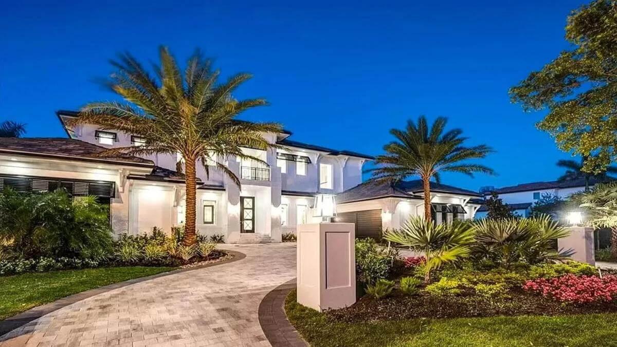 Tropical Oasis with Illuminated Driveway and Palms