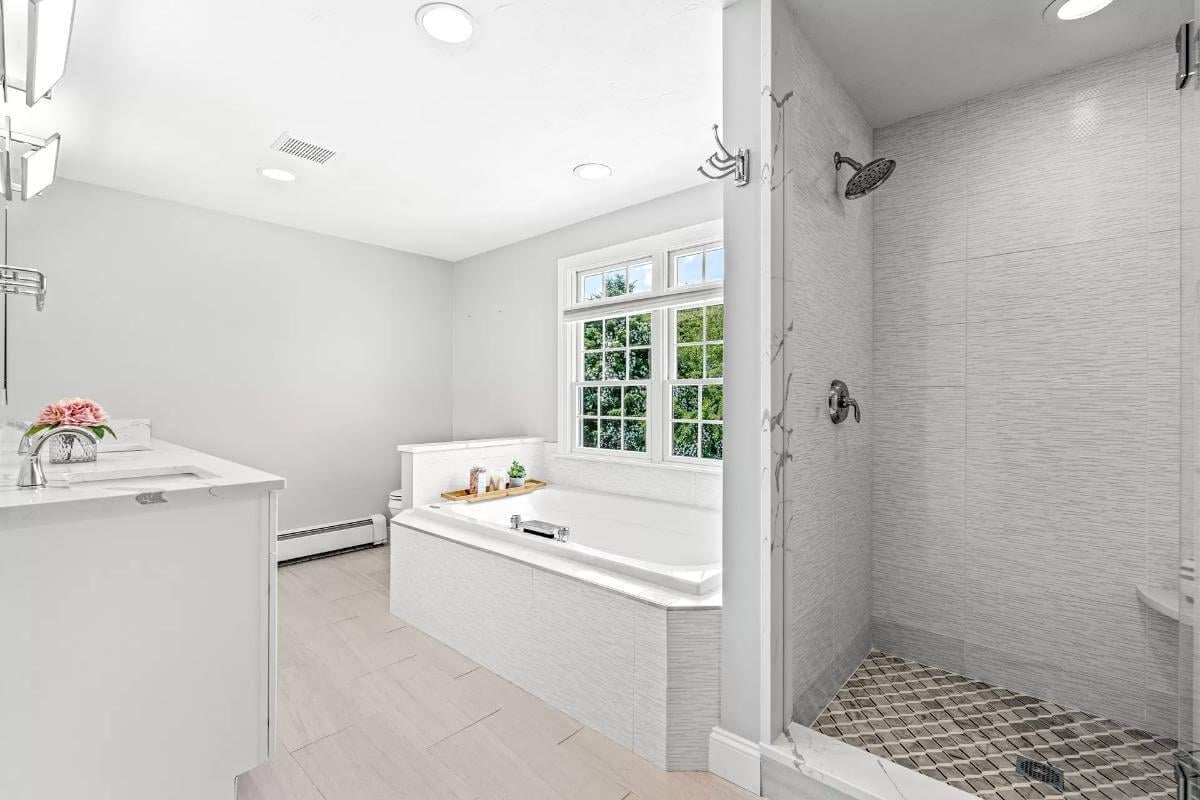 Notice the Spa-Like Soaking Tub in This Bright Bathroom Retreat