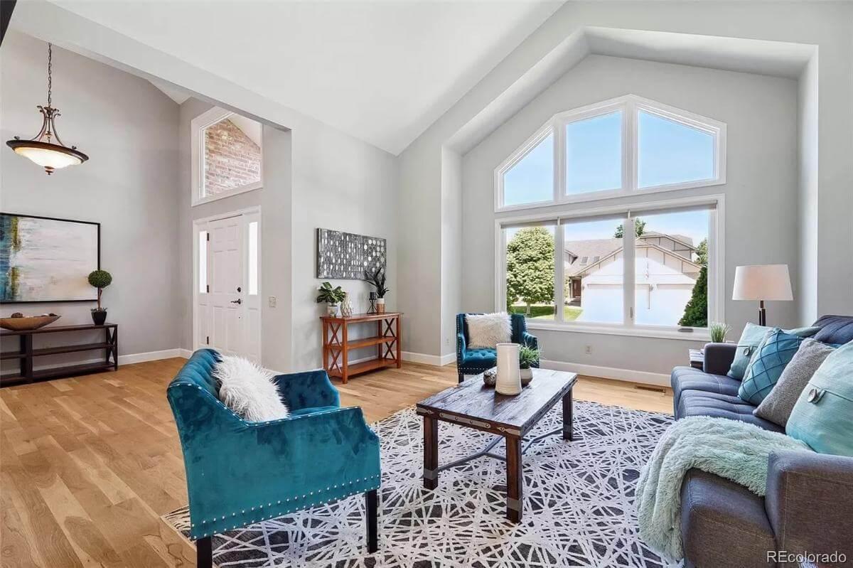Wow, Check Out the Vaulted Ceilings and Natural Light in This Living Room