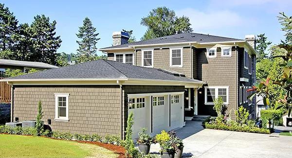 Craftsman Exterior Highlighting Classic Shingle Siding and Functional Garage
