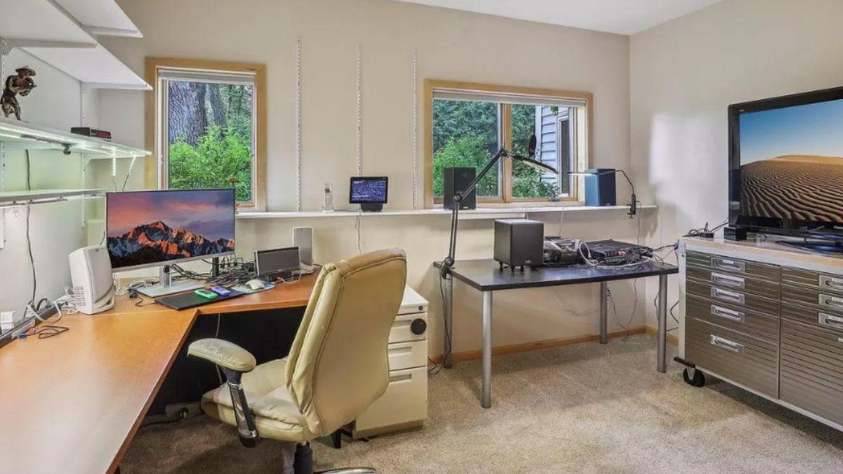 Tech-Savvy Home Office with Green Views and Modern Setup