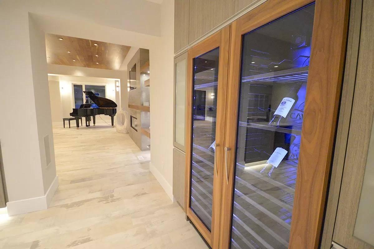 Discover This Elegant Hallway Leading to a Grand Piano Room