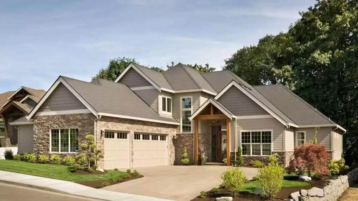 Check Out the Charming Craftsman with Stone Accents and a Covered Entryway