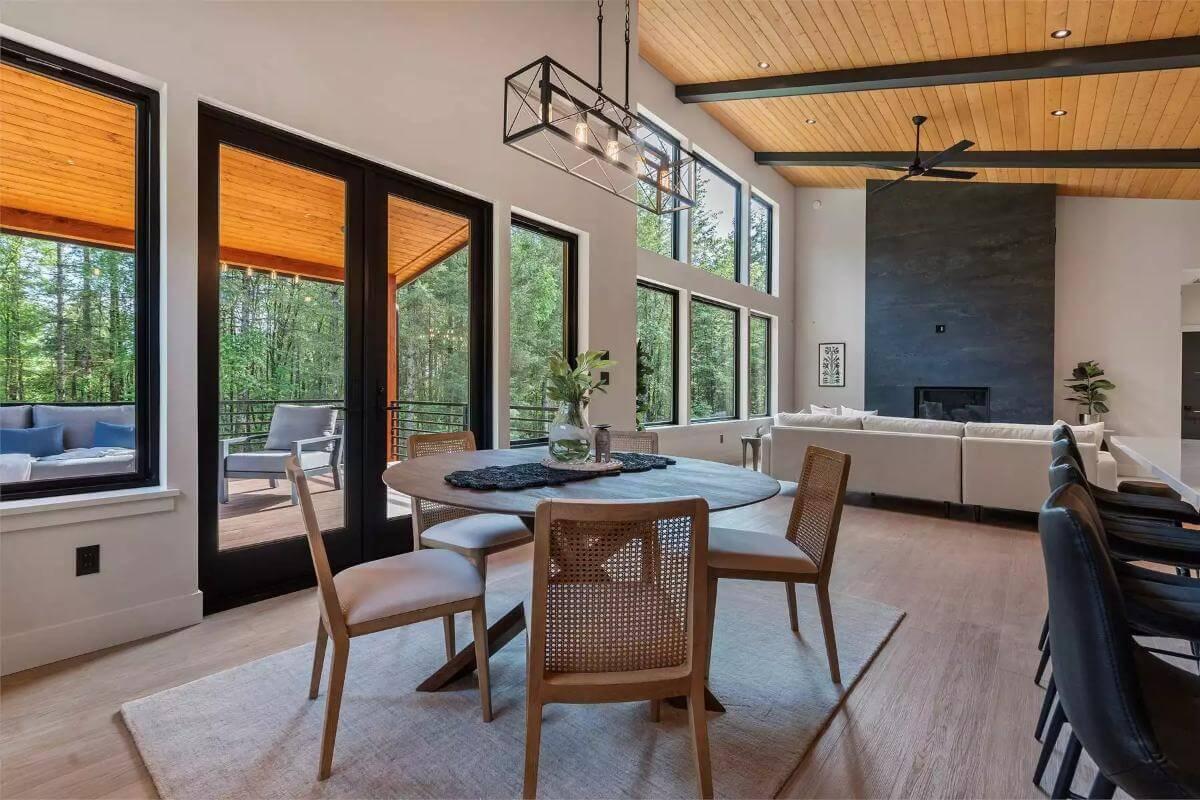 Inviting Dining Area Overlooking Wooded Serenity