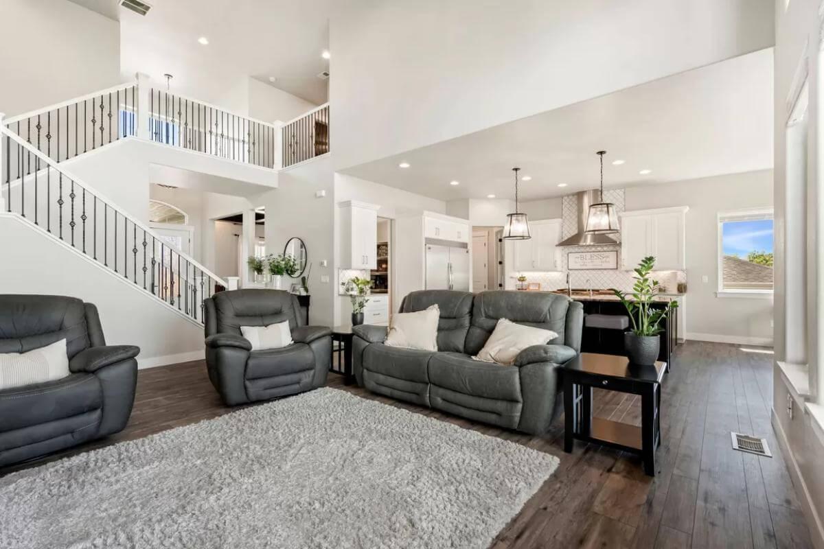Spacious Living Area with Lofted Balcony and Open Kitchen