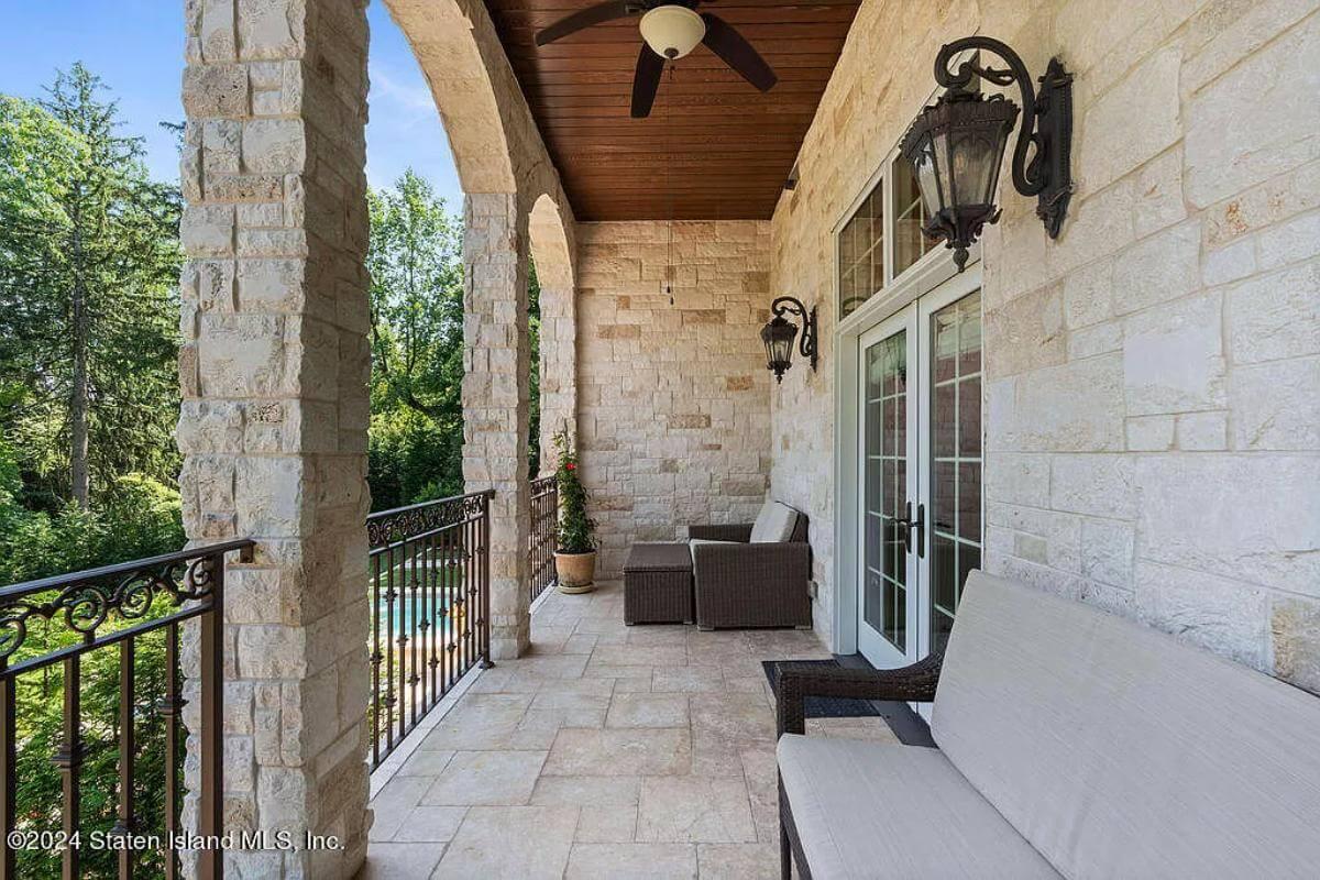 Relax on This Stone Balcony with Arched Views