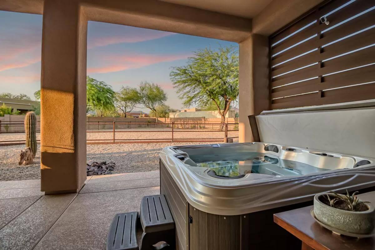 Experience Serenity in This Private Patio with a Spa