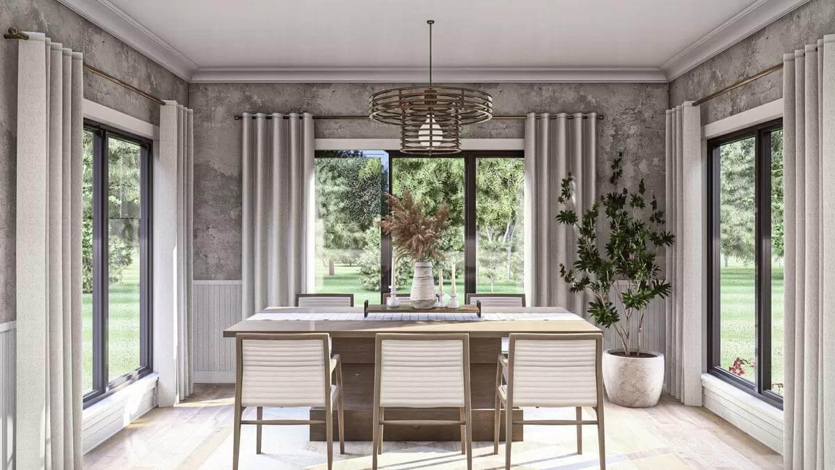 Rustic Dining Room with Nature Views and a Statement Pendant Light