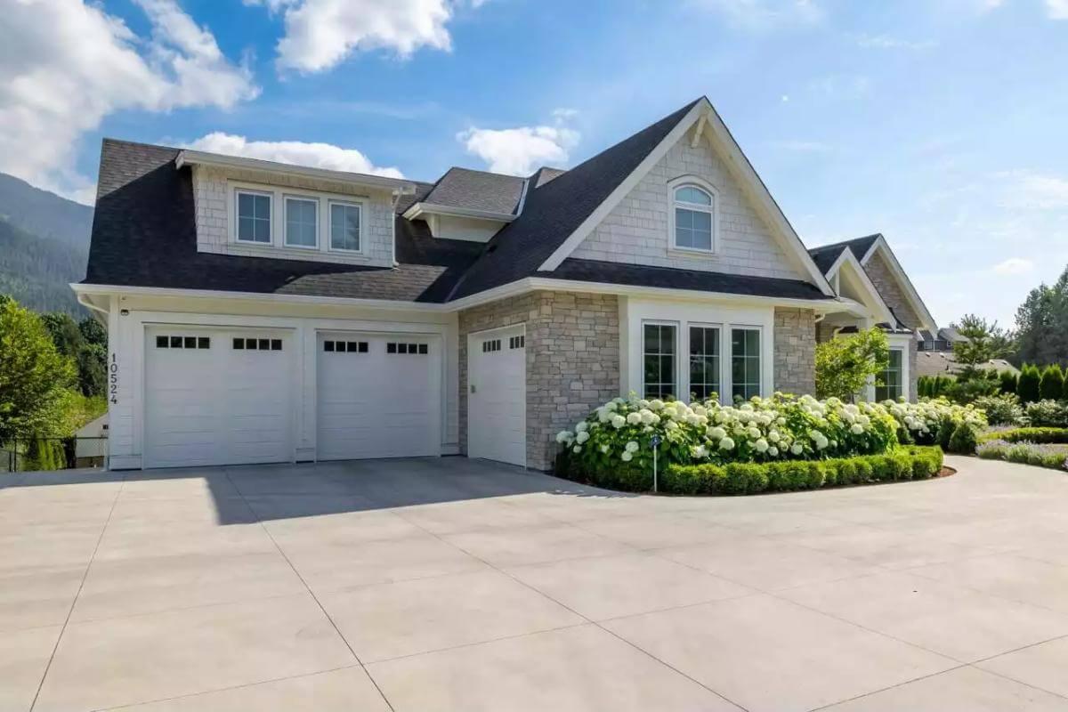 Check Out the Charming Garage Design with Its Clean Lines and Symmetrical Appeal