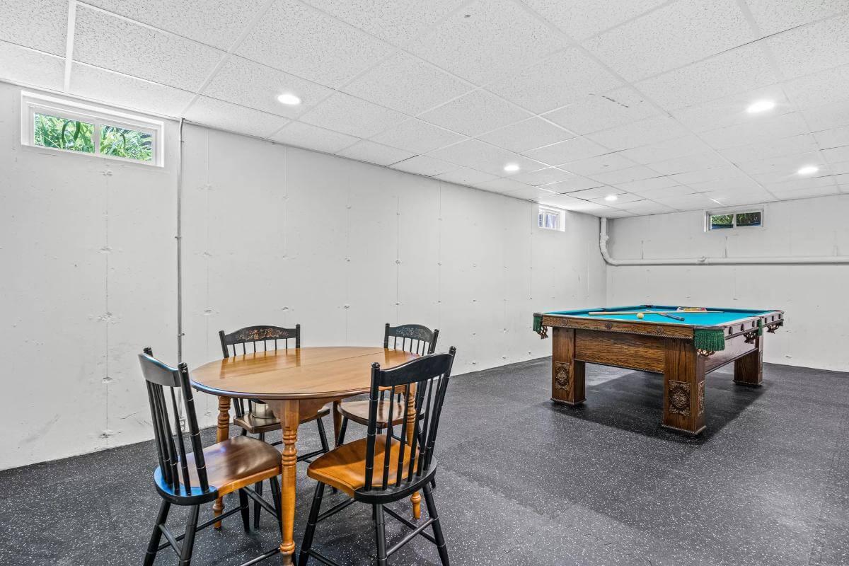 Look at This Spacious Basement Game Room with Billiards Table
