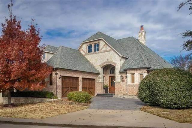Step into European Charm with This Stone and Stucco Facade