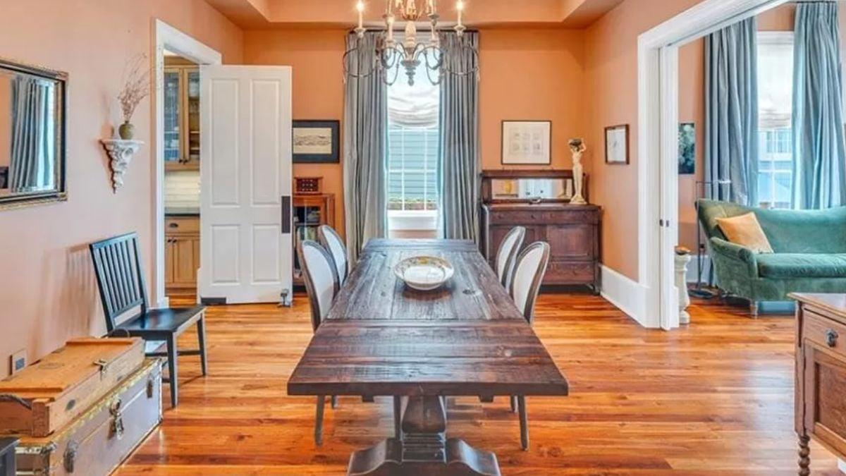 Explore This Rustic Dining Room with its Warm Wooden Table